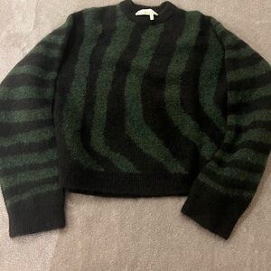 Green and black wool sweater